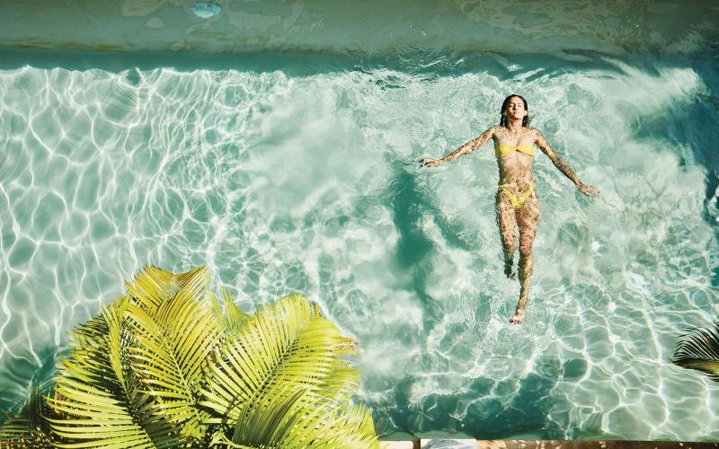 a woman soaking in a pool